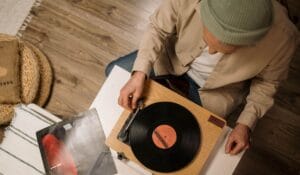 man that take in hands vinil record